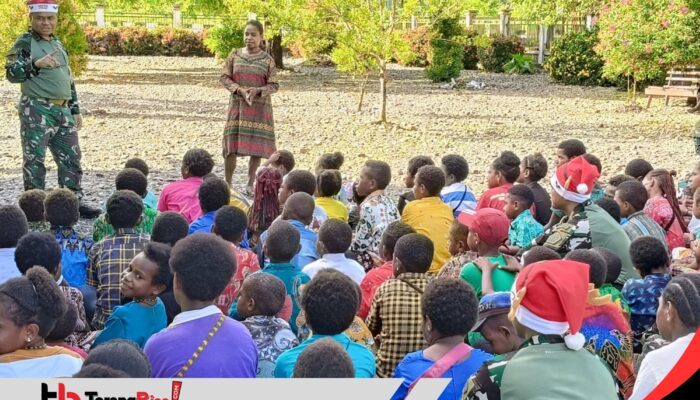 Satgas Koops TNI Habema Tebarkan Keceriaan Natal Bersama Anak-Anak Sekolah Minggu