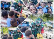 Ciptakan Suasana Hangat di Tengah Kegiatan, Dansatgas TMMD Berbagi Cokelat kepada Anak-Anak