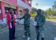Anak SD Pigapu Antusias Sambut Bantuan Sarana Olahraga dari Satgas TMMD