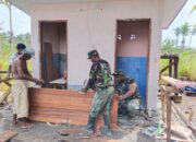 Satgas TMMD-124 Fokus pada Pemasangan Pintu MCK