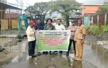 Jalan Utama Rusak dan Tergenang Air, Pemkam Nawaripi Inisiatif Perbaiki Gunakan Dana Rehab Rumah dan Pembersihan Saluran Air